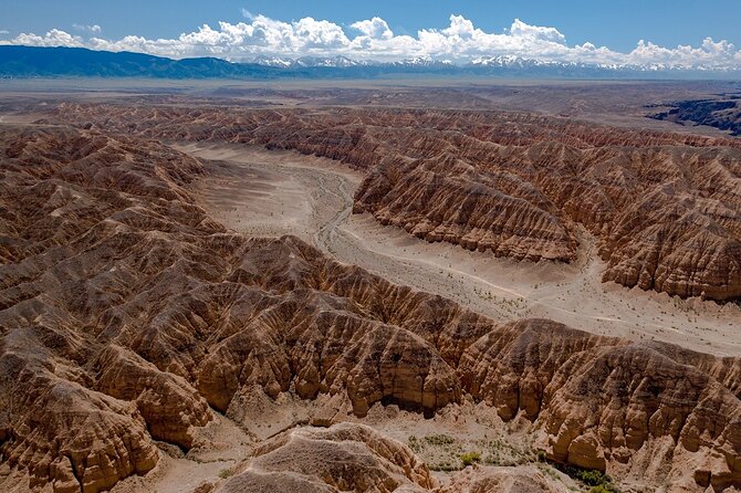 Discovering 6 Stunning Sights on Private Tour of Charyn Canyon - Moon Canyon and its red-to-yellow rock